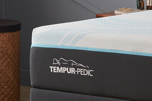 Closeup of a TEMPUR-Pedic logo on a breeze mattress